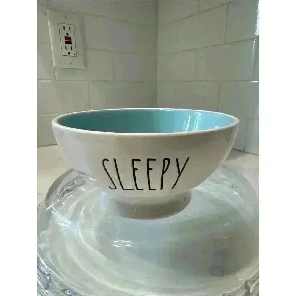 Rae Dunn 'Sleepy' Bowl White With Black Lettering And Light Blue Inside.